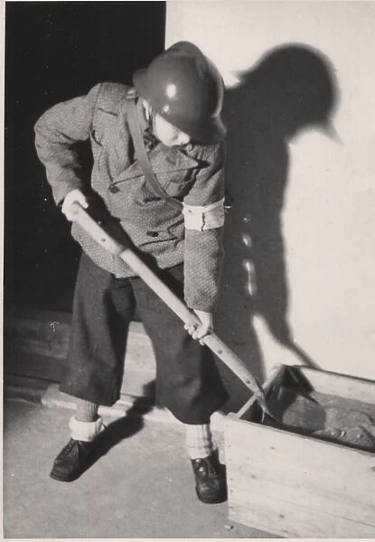 Finnish boy scout as ARP warden, Helsinki, WW2
