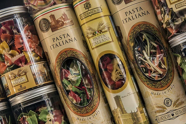 Colorful Italian pasta tin packaging containers on sale in a drugstore of Trastevere