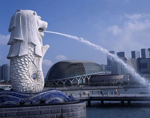 SINGAPORE, Merlion Park Merlion statue and fountain in foreground with new esplanade