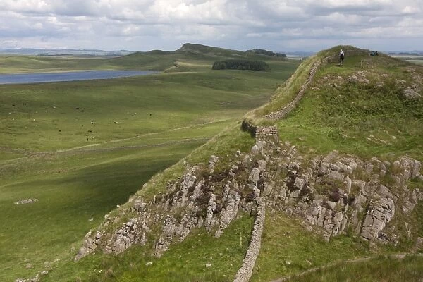 View of moorland and lake with remains of Roman fortifications, Hadrians Wall