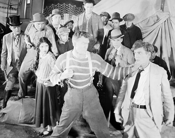 THE HAPPY WARRIOR, 1925. Andreas Randolph, Malcolm MacGregor, Olive Borden, Jack Henrick, William Dunn, and Gardener James in a scene from the film