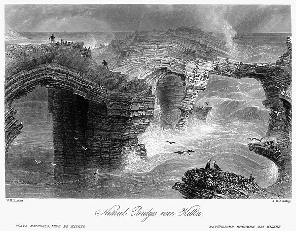 IRELAND: KILKEE, c1840. View of natural bridges on the Atlantic coast of Ireland near Kilkee, County Clare. Steel engraving, English, c1840, after William Henry Bartlett