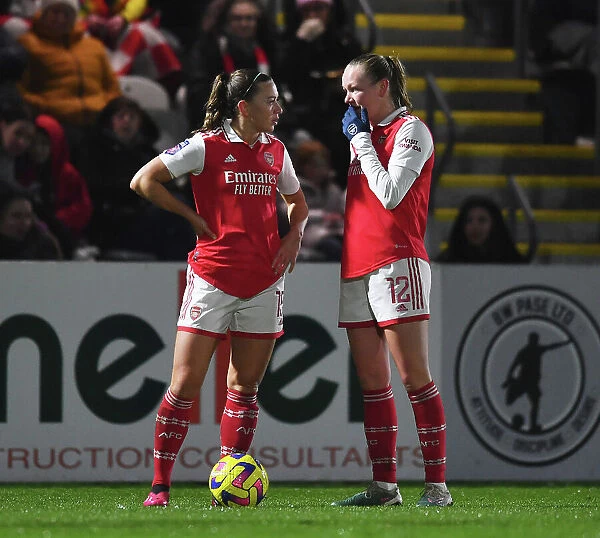 Arsenal Women vs. Liverpool Women: McCabe and Maanum in Action during the 2022-23 FA Women's Super League Clash: A High-Octane Battle at Meadow Park