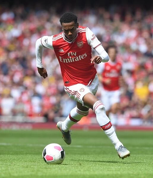 Arsenal's Joe Willock Shines: A Dominant Performance Against Burnley in Premier League Clash