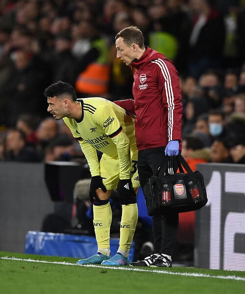Arsenal's Ricky O'Donoghue Tends to Injured Gabriel Martinelli during Crystal Palace Match (2021-22)