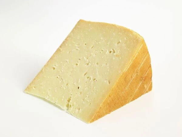 Slice of Spanish Idiazabal ewes milk cheese