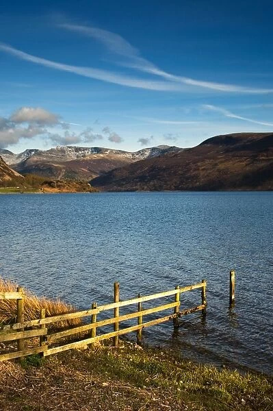 Fence on lake shore at Lake District, Cumbria, England