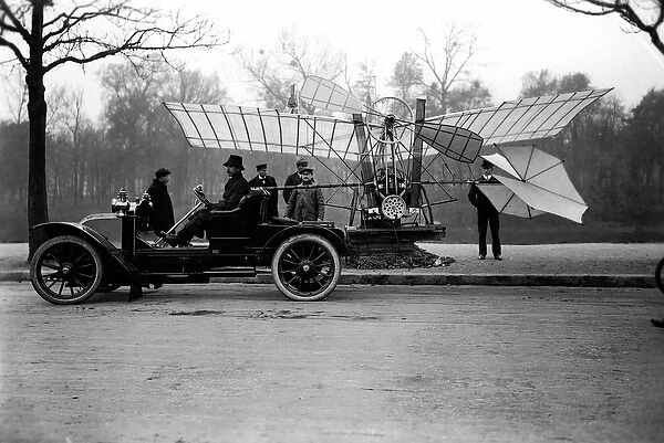 Airman Alberto Santos Dumont (Santos-Dumont) (1873-1932) carrying his plane in his car