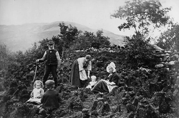 Crofting Family Cutting Peat, (b  /  w photo)