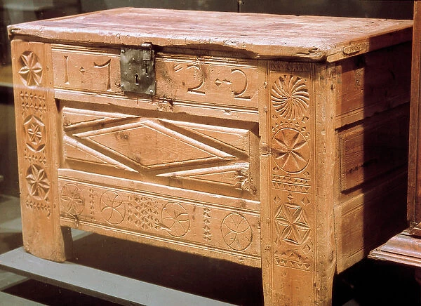 Furniture: carved peasant chest used to store linen. 1722