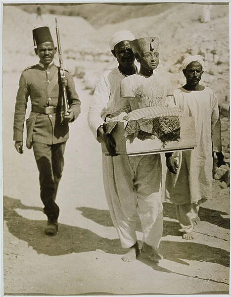 The mannequin or bust of Tutankhamun being carried from the tomb, Valley of the Kings, 1922 (gelatin silver print)