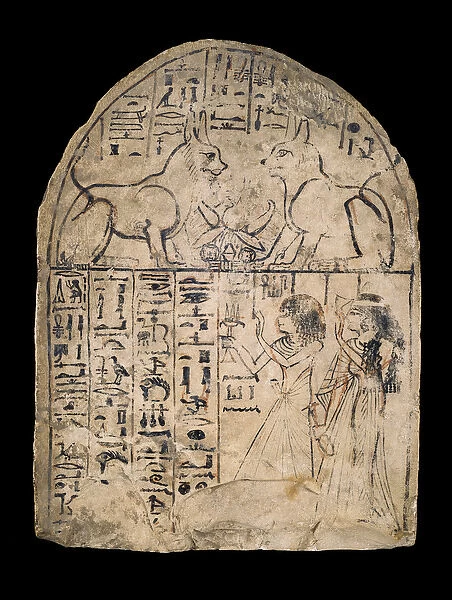 Stela showing a man and woman adoring two cats who are manifestations of the two aspects