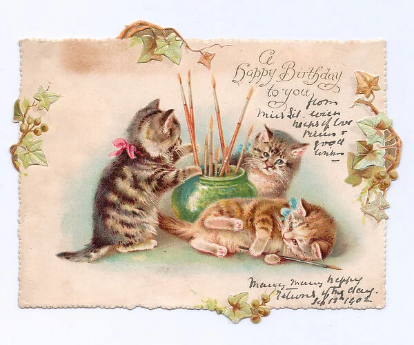 A Victorian Birthday card of three kittens playing with artist paint brushes in a bowl, c
