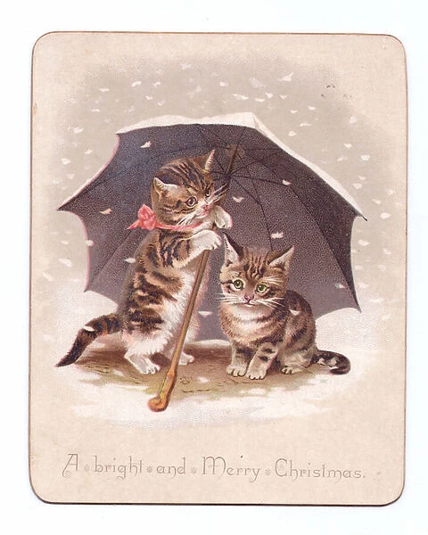 A Victorian Christmas card of two kittens sheltering under an umbrella in the falling