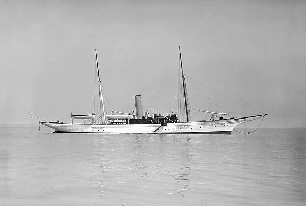 The 70 ton steam yacht Ombra at anchor, 1911. Creator: Kirk & Sons of Cowes