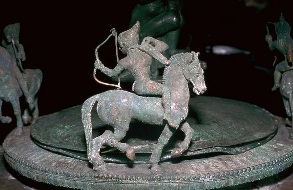 Detail of an Etruscan bronze of an Amazon archer, 6th century BC