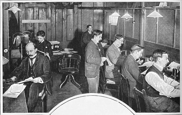 Tape and telegraph room of the Daily Express newspaper, London, c1900 (1903)