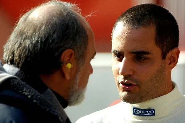 Formula One Testing: Juan Pablo Montoya McLaren Mercedes chats with his father Pablo Montoya