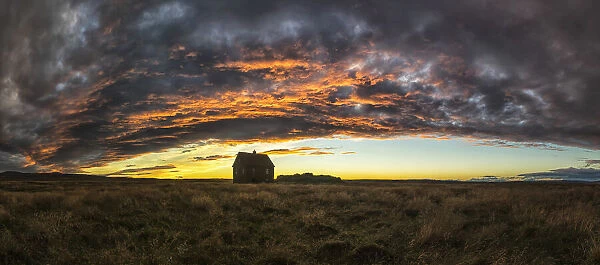 Abandoned House In Rural Iceland With A Beautiful Sunset In The Sky; Iceland