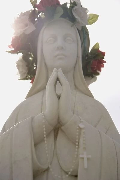 Adorned Praying Statue