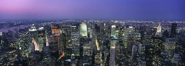 Aerial View Of Midtown Manhattan Illuminated At Dusk