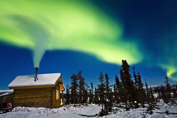 Aurora Over Cabin In The White Mountian Recreation Area During Winter In Interior Alaska