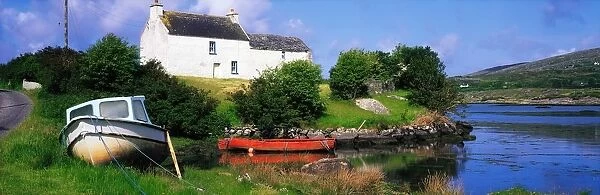 Ballycrovane, Beara Peninsula, Co Cork, Ireland; House And Boats Near The Shore