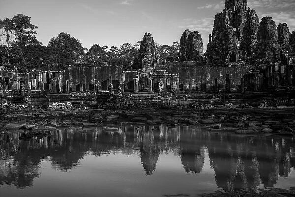 Bayon Temple Reflected In Water, Angkor Thom; Krong Siem Reap, Siem Reap Province, Cambodia