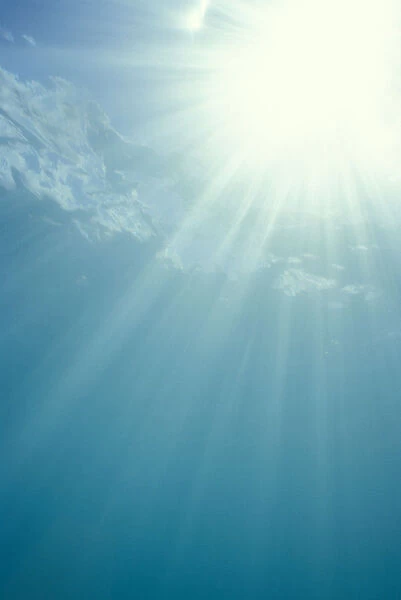 Brilliant Sunburst Through Water Surface With Sunrays, View From Underwater