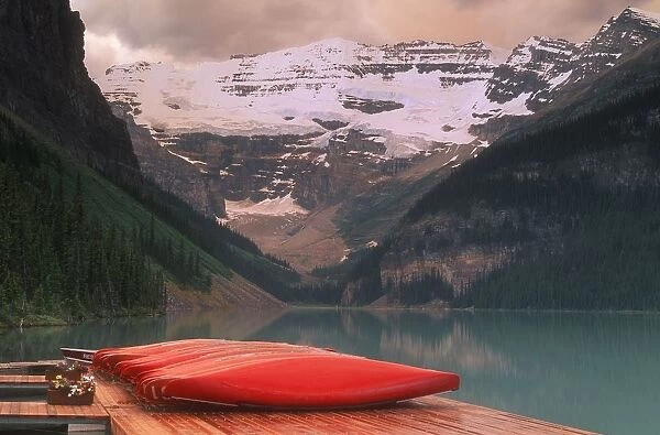 Canoes Lined On A Dock, Lake Louise, Banff National Park, Banff, Alberta, Canada