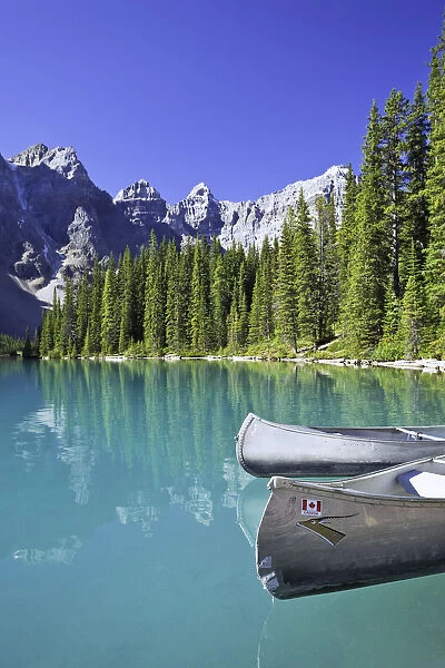 Canoes In Moraine Lake And Valley Of The Ten Peaks, Banff National Park, Alberta