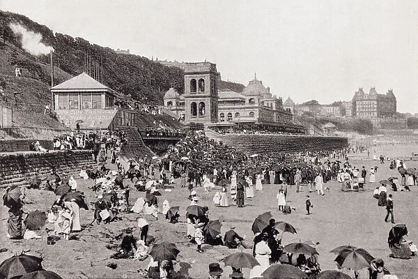 The Childrens Corner, South Bay, Scarborough, North Yorkshire, England, seen here in the 19th century. From Around The Coast, An Album of Pictures from Photographs of the Chief Seaside Places of Interest in Great Britain and Ireland published London, 1895, by George Newnes Limited
