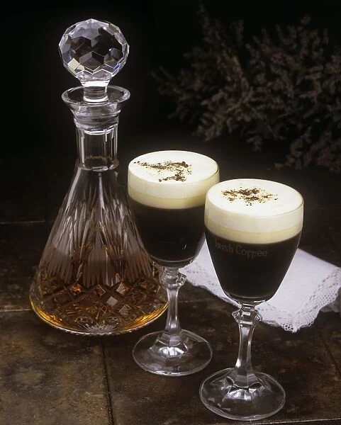 Close-Up Of Glasses Of Coffee Liqueur With A Decanter Of Whiskey
