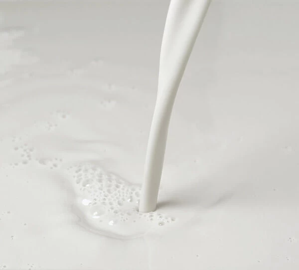 Close-Up Detail Of Milk Pouring
