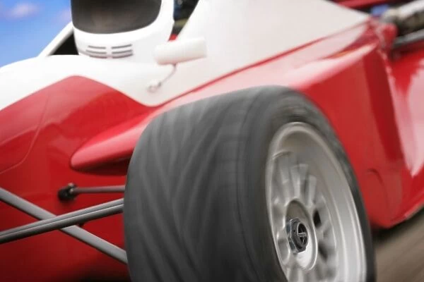 A Close-Up Of A Red Race Car