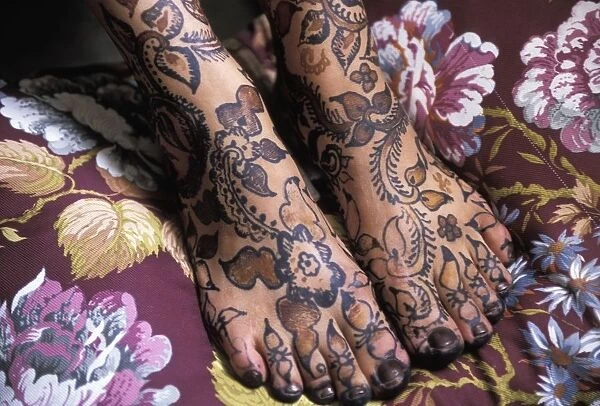 Close-Up Of Womans Feet With Henna Tattoo