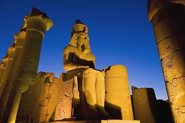 Colonnade Of Amenophis Iii With Statue Of Ramses Ii At Dusk