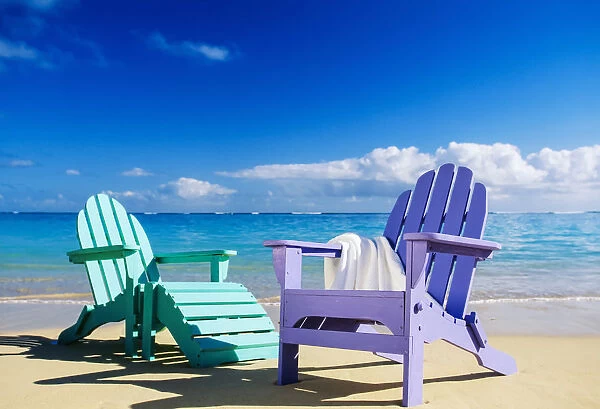 Colorful Beach Chairs On Beach, Calm Waves Washing Ashore Turquoise Water