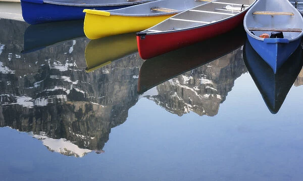 Colorful Canoes At Moraine Lake; Banff, Alberta, Canada