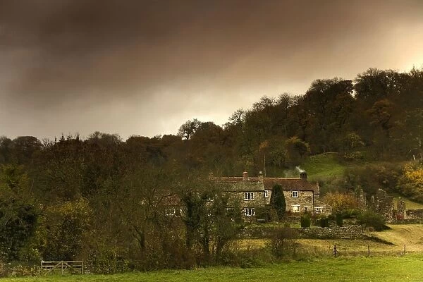 Country Houses, Dramatic Sky In Background; North Yorkshire, England, Uk