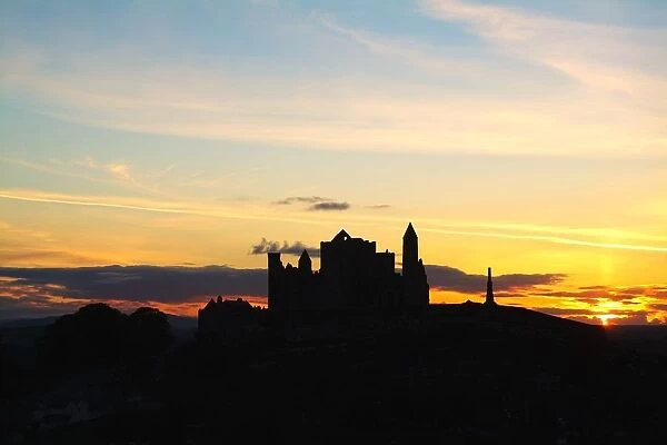 County Tipperary, Ireland; Rock Of Cashel Against Sunset