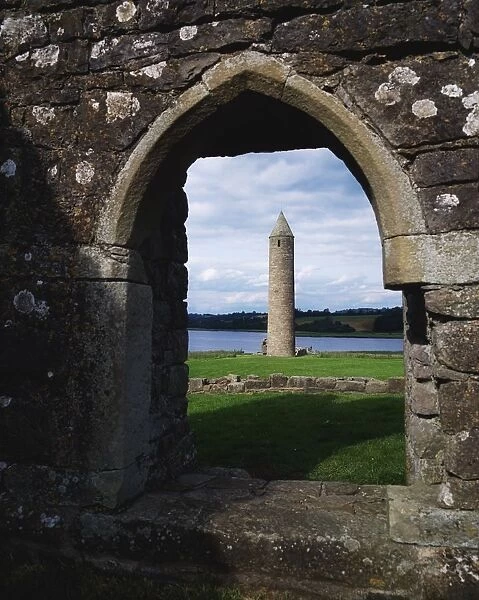 Devenish Monastic Site, Lower Lough Erne, Ireland; Medieval Monastic Site With Round Tower In The Distance