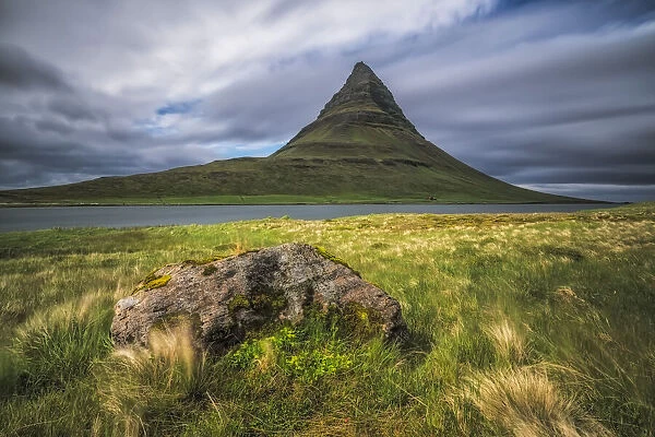 Dramatic long exposure over Kirkjufell, the most photographed mountain in Iceland, Snaefellsness Peninsula; Iceland