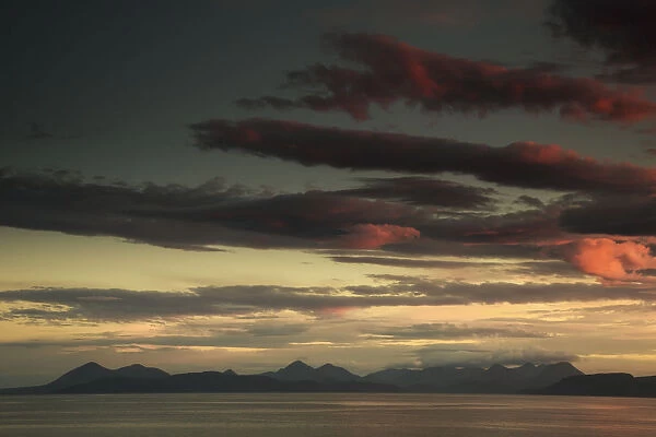 Dramatic sky at sunset over the ocean; Skye scotland
