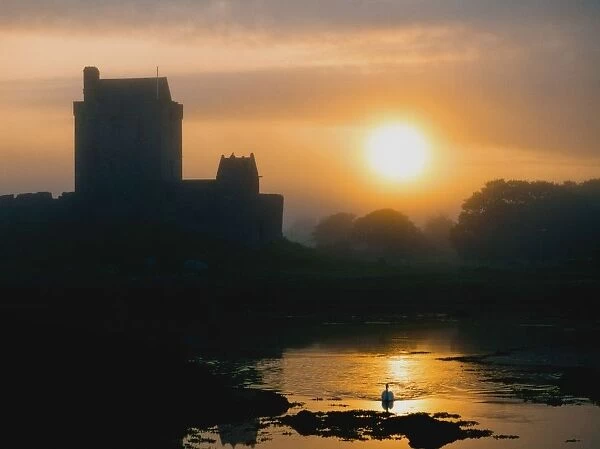 Dunguaire Castle, Kinvara, Co Galway, Ireland; Silhouette Of A 16Th Century Castle At Sunset