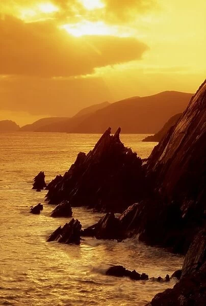 Dunmore Head, Dingle Peninsula, County Kerry, Ireland; Sunset And Cliffs