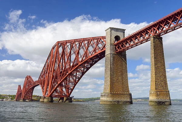The famous Forth Bridge over Firth of Forth at low tide at South Queensferry in Edinburgh, Scotland, United Kingdom
