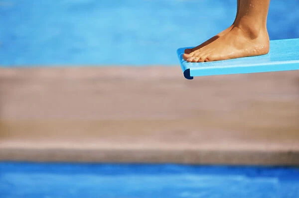 Feet on a diving board