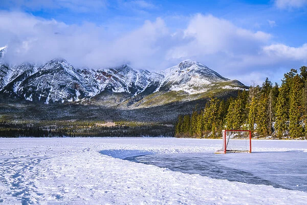 Frozen Pyramid Lake with hockey net, Jasper National Park, Alberta, Canada