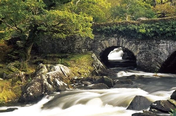Galways Bridge, Killarney National Park, County Kerry, Ireland; Water Flowing Under Bridge